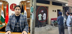 बिल्डिंग सील करते नगर निगम के अधिकारी